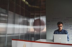 a man working on a laptop